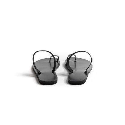 Back view of Astara ladies black flats against a white background.