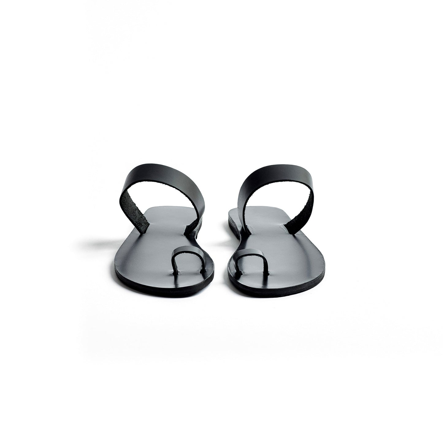 Front view of Astara ladies black flats against a white background.