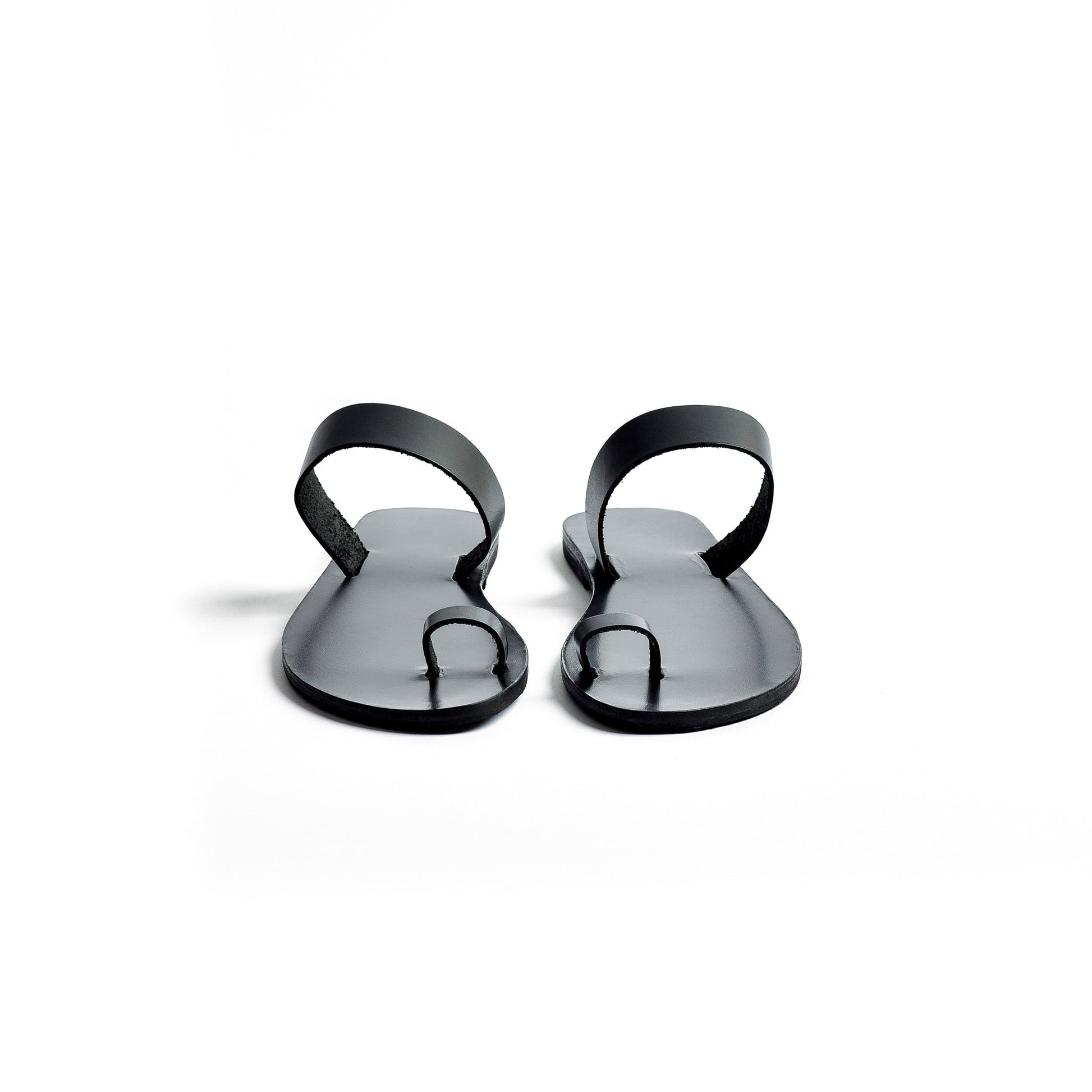 Front view of Astara ladies black flats against a white background.