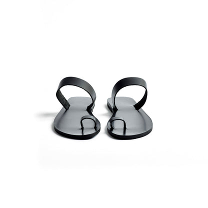 Front view of Astara ladies black flats against a white background.