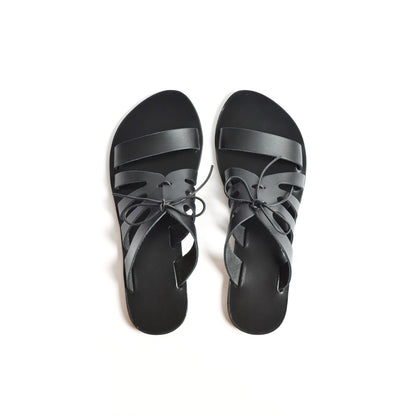 Top view of Chloe black flats with bow shot against a white background. These are flat slippers for womens / flat slippers for ladies.